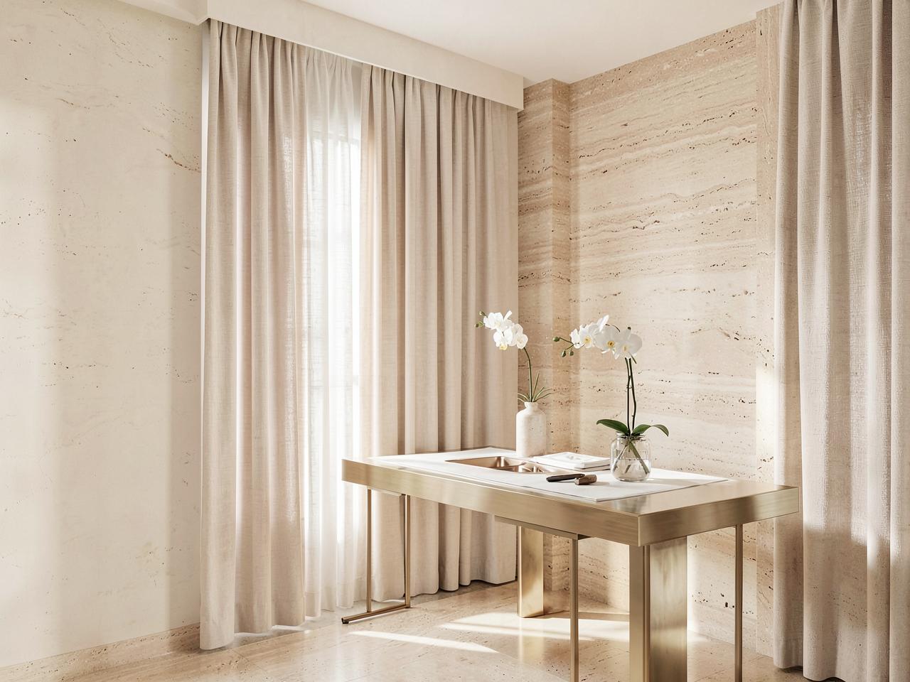 Salón de LUMÉ Studio en tonos crema con luz natural